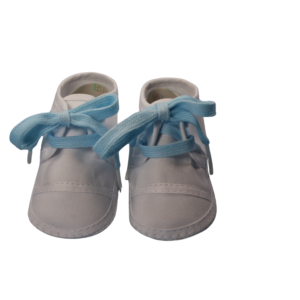 a pair of crib shoes with baby blue shoe laces