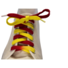 a white sneaker with a red and yellow flat shoelace