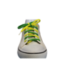 a white shoe with a braided shoelace which is green and yellow