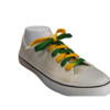 Green and gold bi-colored shoelaces at an angle to the right