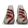 a pair of red and white colored shoelaces side by side
